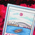 Coloring book page with Sydney Harbour Bridge illustration on pink flowers