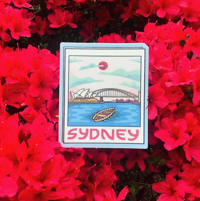 Card with Sydney illustration surrounded by red flowers