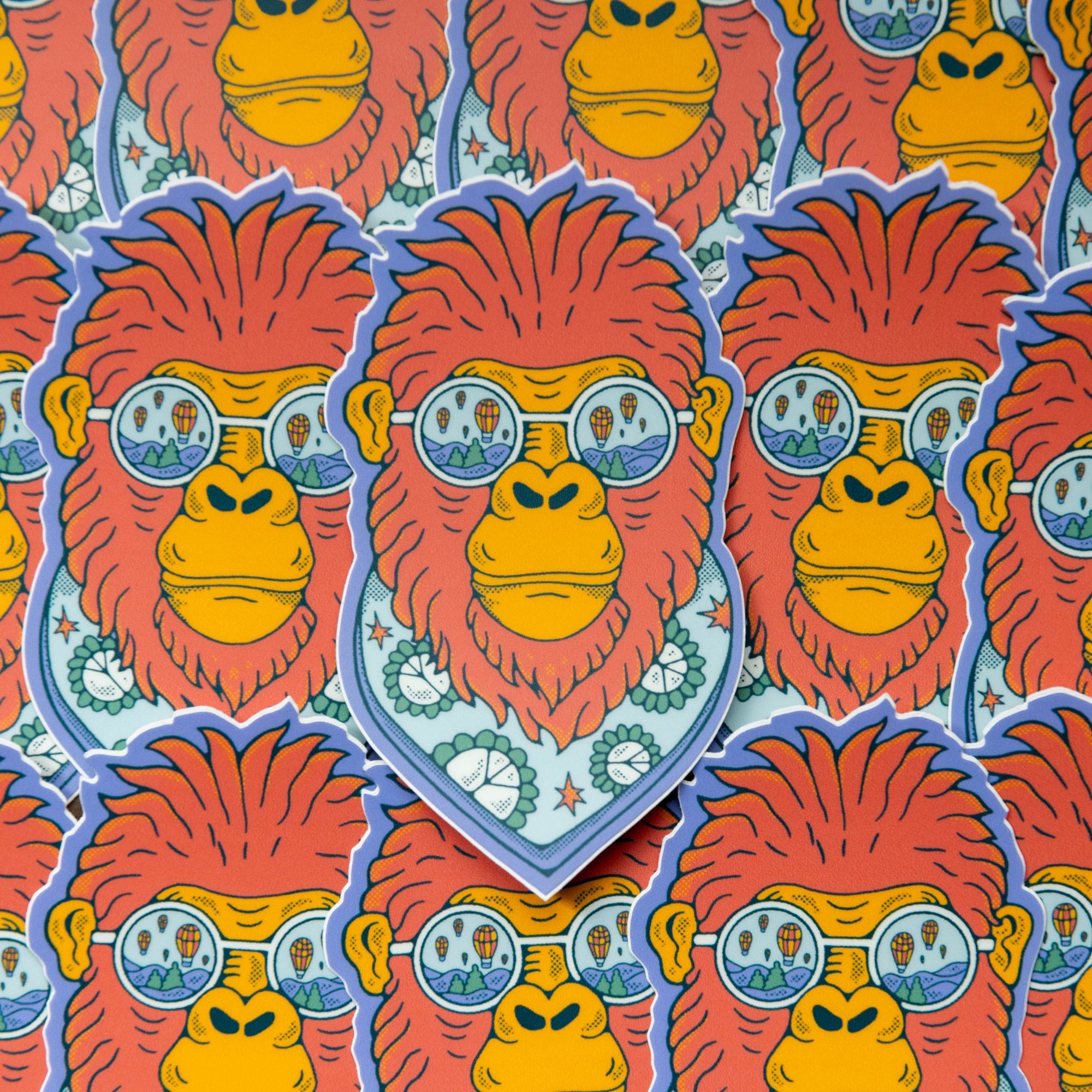 Multiple Bigfoot Balloon Sunglasses stickers arranged together, showing the repeated design and bold colors.

