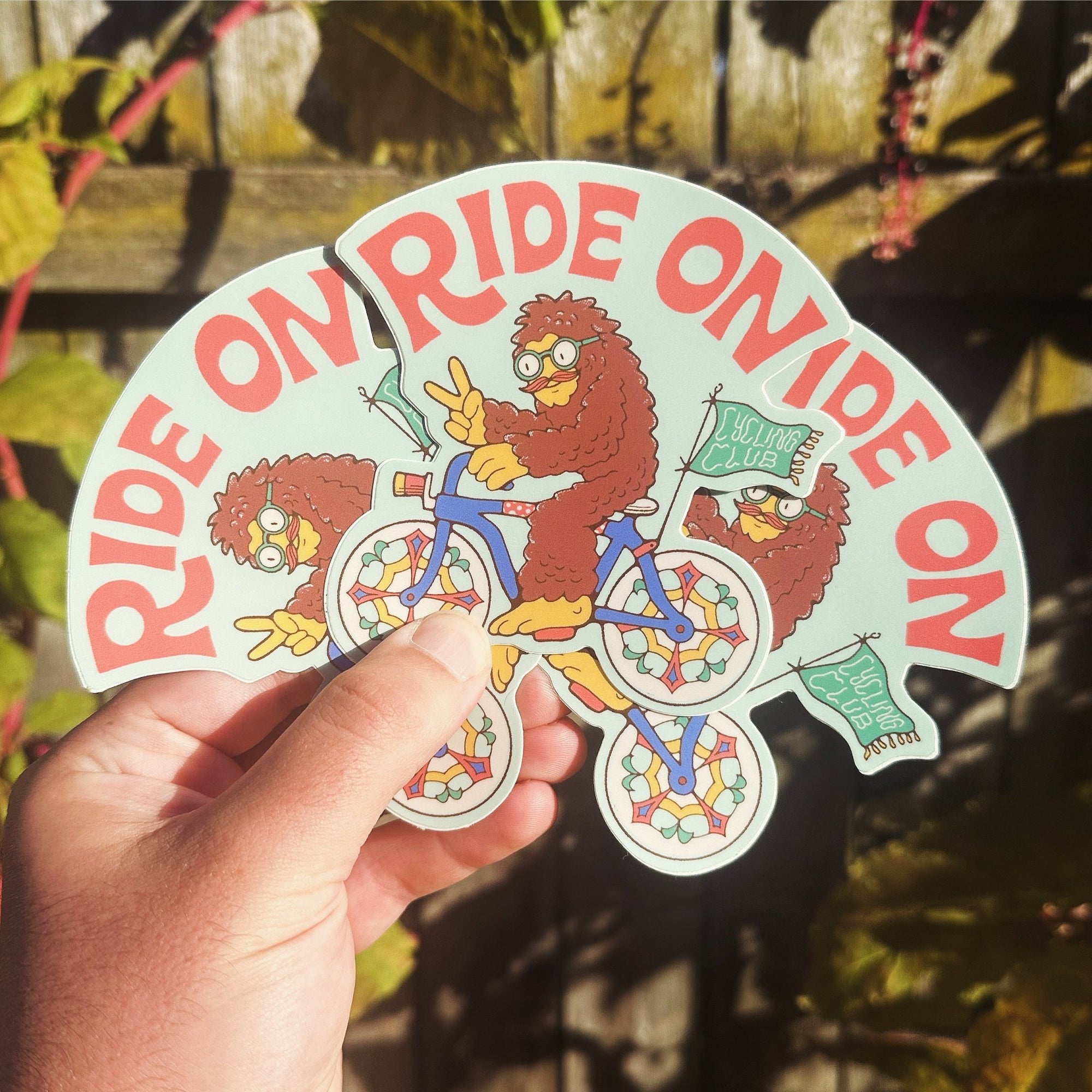 Multiple Ride On Bigfoot stickers stacked together for a fun patterned layout.

