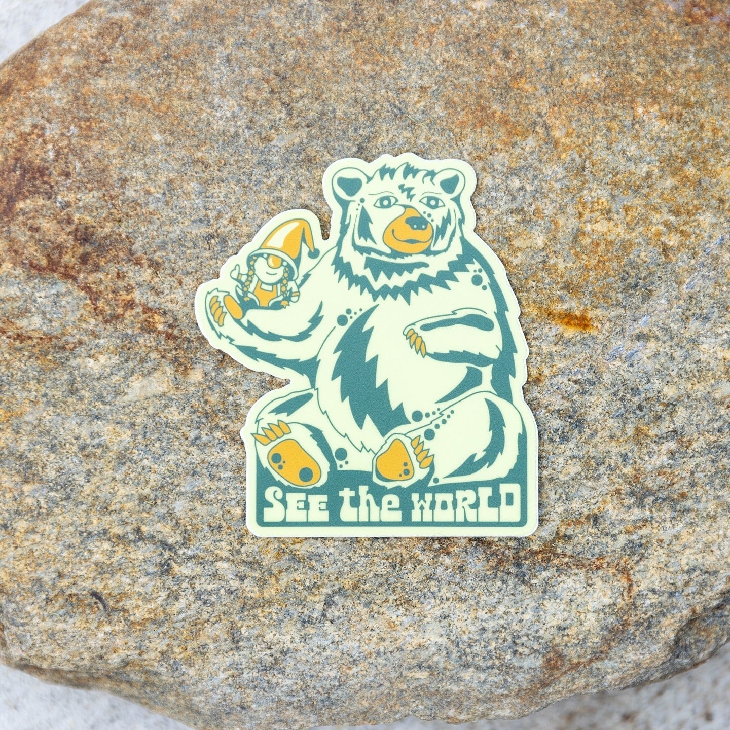 Sticker placed on textured outdoor surface with clear view of design

