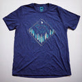 Flat-lay of navy t-shirt featuring a bear and forest graphic with moon and stars

